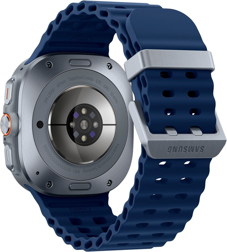 Rückseite einer blauen Smartwatch mit silbernen Akzenten und Herzfrequenzsensor.