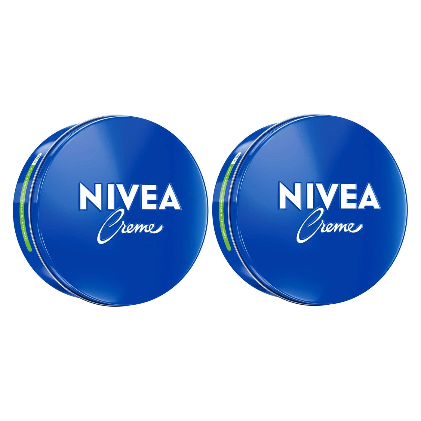 Zwei blaue Nivea Creme Dosen mit weißer Schrift und grünem Text am Rand.