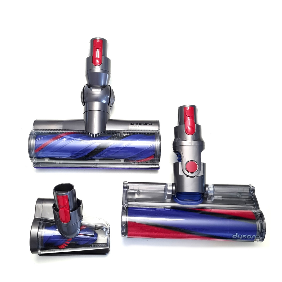 Drei Dyson Staubsaugeraufsätze auf weißem Hintergrund. Verschiedene Größen und Formen.