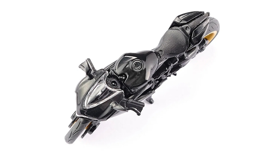 Schwarzes Motorrad auf weißem Hintergrund, glänzend, detailliert, Spielzeug