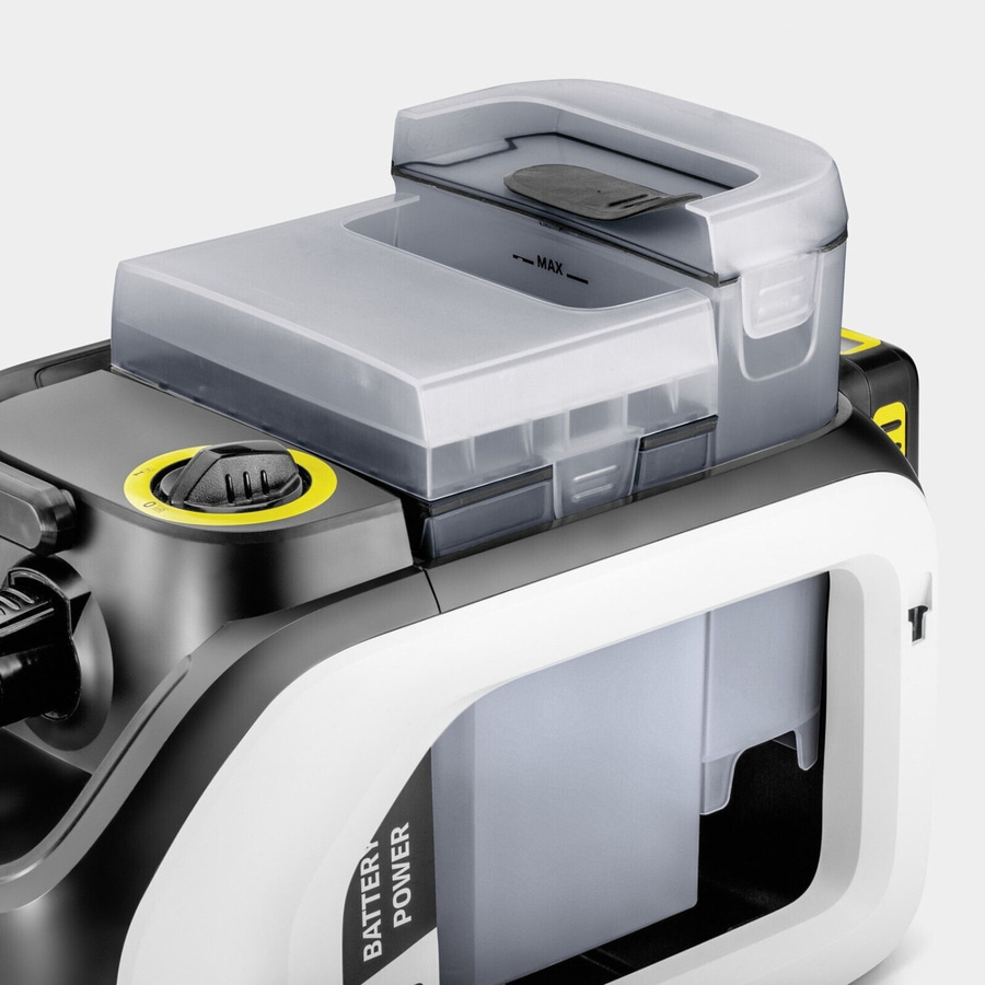 Nahaufnahme eines schwarzen und weißen Reinigungsgeräts mit Wassertank und Batterie.