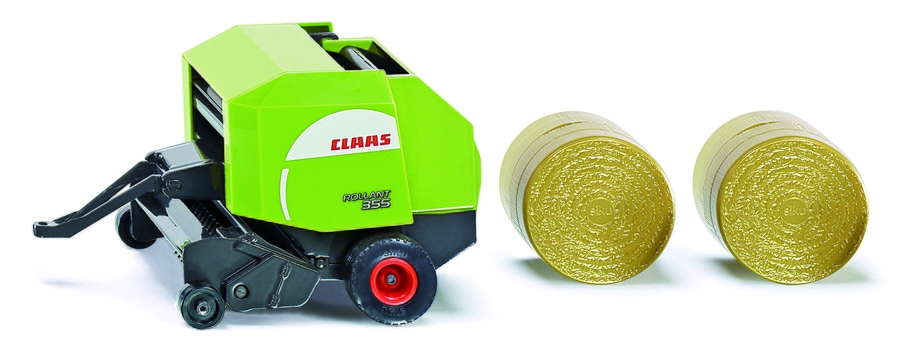 Grüner Claas Rollant 355 Ballenpressen-Spielzeug mit zwei Heuballen