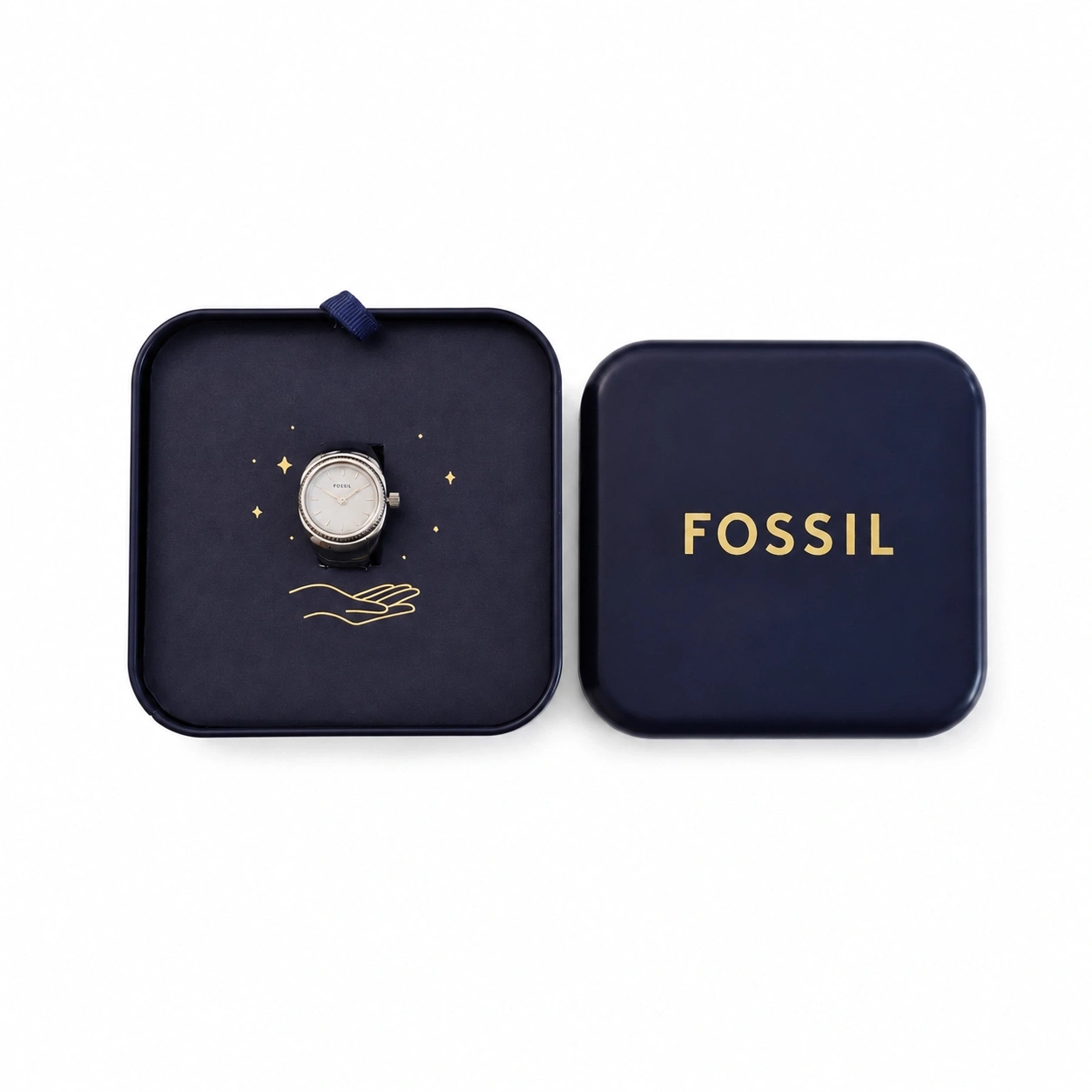 Fossil-Uhr in einer dunkelblauen Geschenkbox mit Sternenmuster.