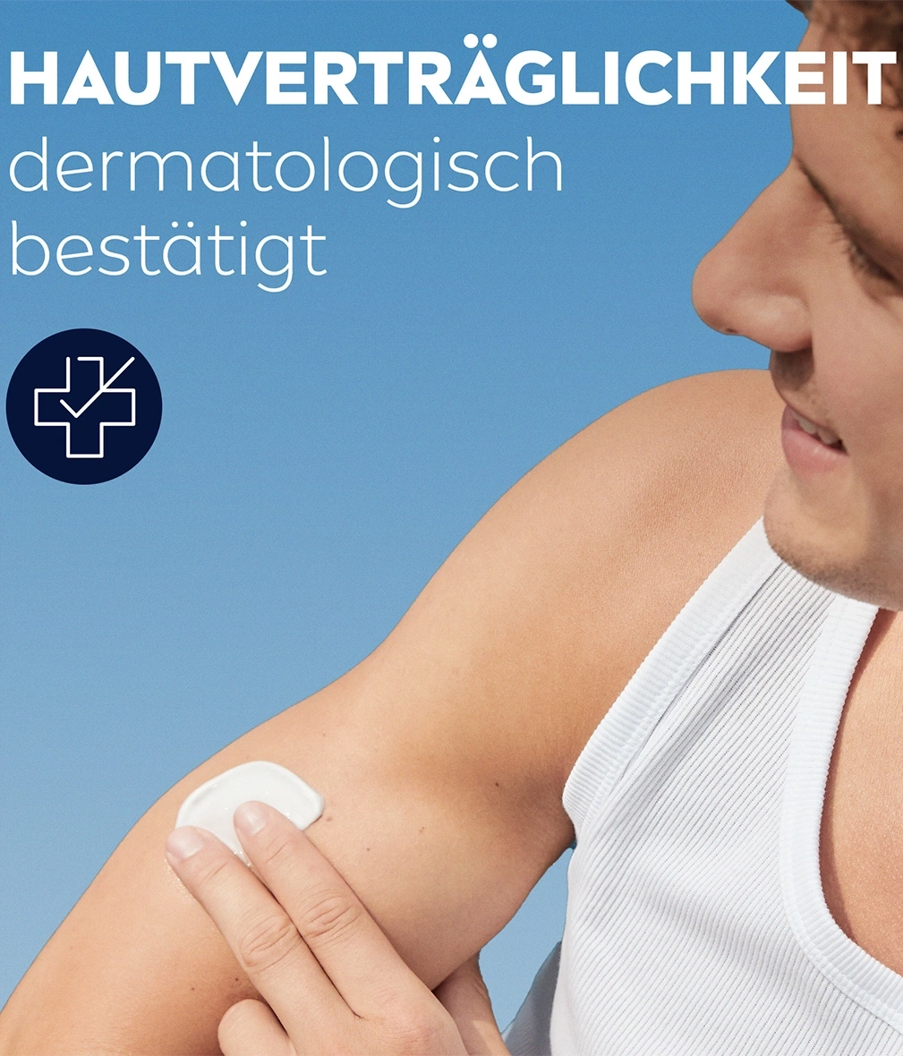 Mann trägt Creme auf, Hautverträglichkeit dermatologisch bestätigt.