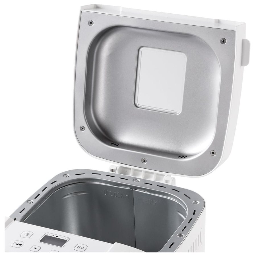 Nahaufnahme eines Brotbackautomaten mit geöffnetem Deckel, Innenansicht