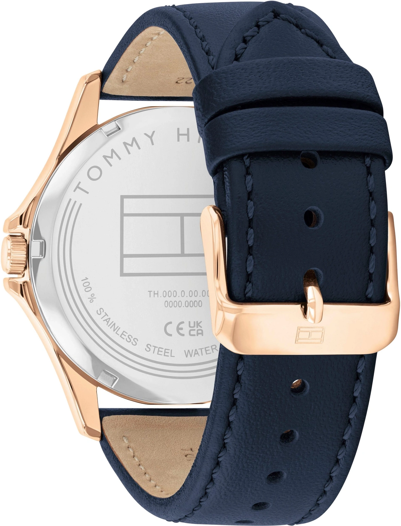Die Rückseite einer blauen Lederarmbanduhr mit einem roséfarbenen Gehäuse und Tommy Hilfiger Logo.