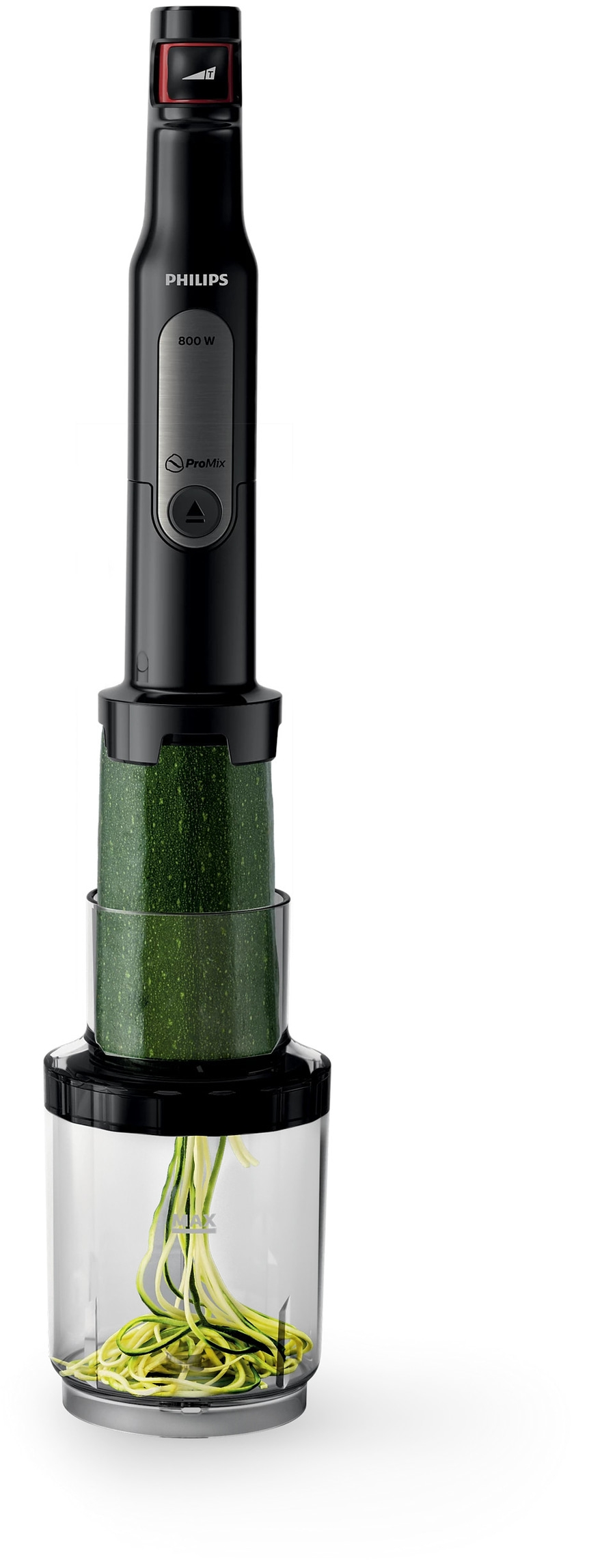 Philips Küchengerät mit Zucchini, die in einem Behälter verarbeitet wird.