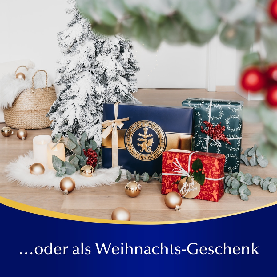 Weihnachtsgeschenke mit Lindt & Sprüngli Schokolade im festlichen Ambiente.
