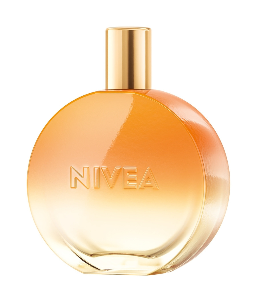 Nivea-Parfümflasche, rund, orangefarben, mit goldenem Deckel, auf weißem Hintergrund