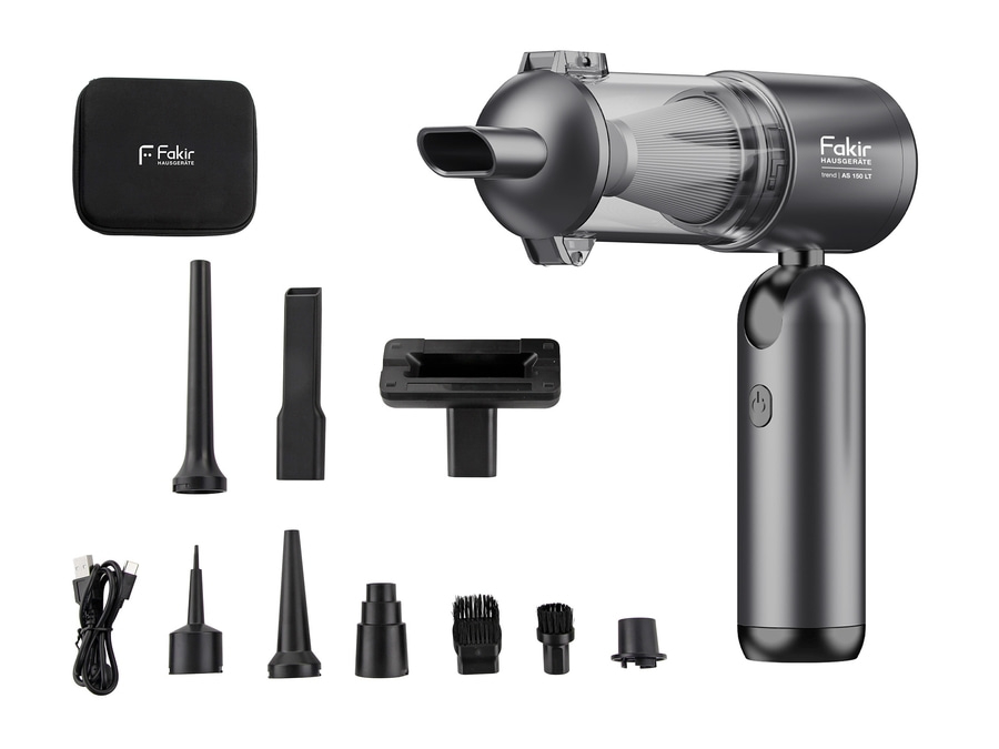 Ein Fakir Handstaubsauger mit verschiedenen Aufsätzen und Ladekabel, auf weißem Hintergrund.
