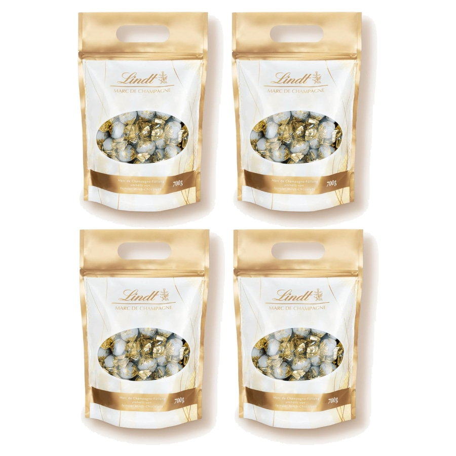 Vier Packungen Lindt Marc de Champagne Pralinen, 700g