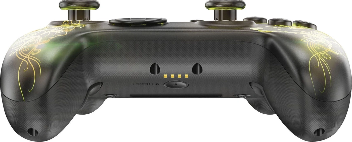 Schwarzer Controller mit gelben Verzierungen und Leuchtpunkten.