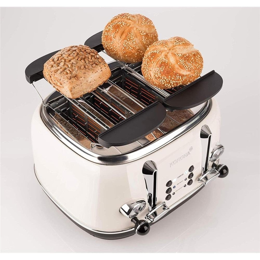 Ein Toaster mit drei Brötchen, die auf dem Toaster liegen, bereit zum Toasten.
