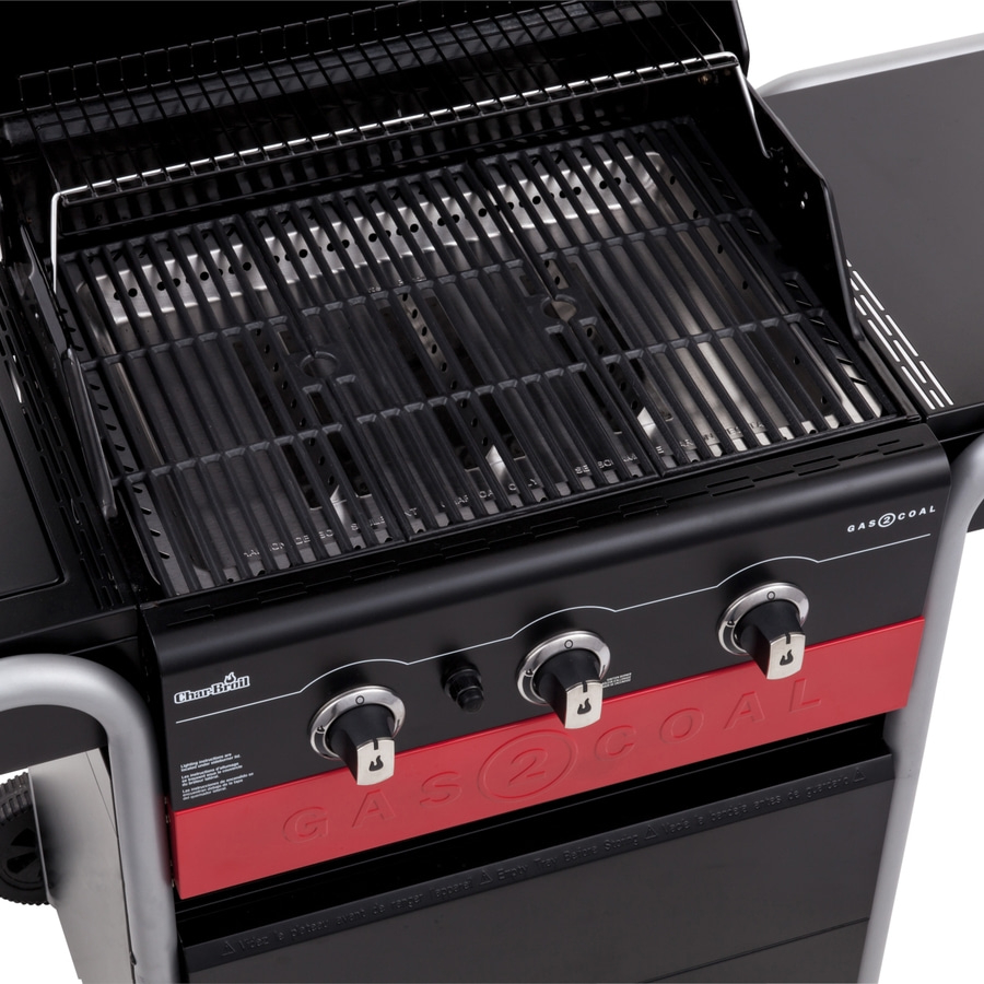 Gasgrill mit schwarzem Grillrost und roter Frontplatte mit der Aufschrift GAS 2 COAL.