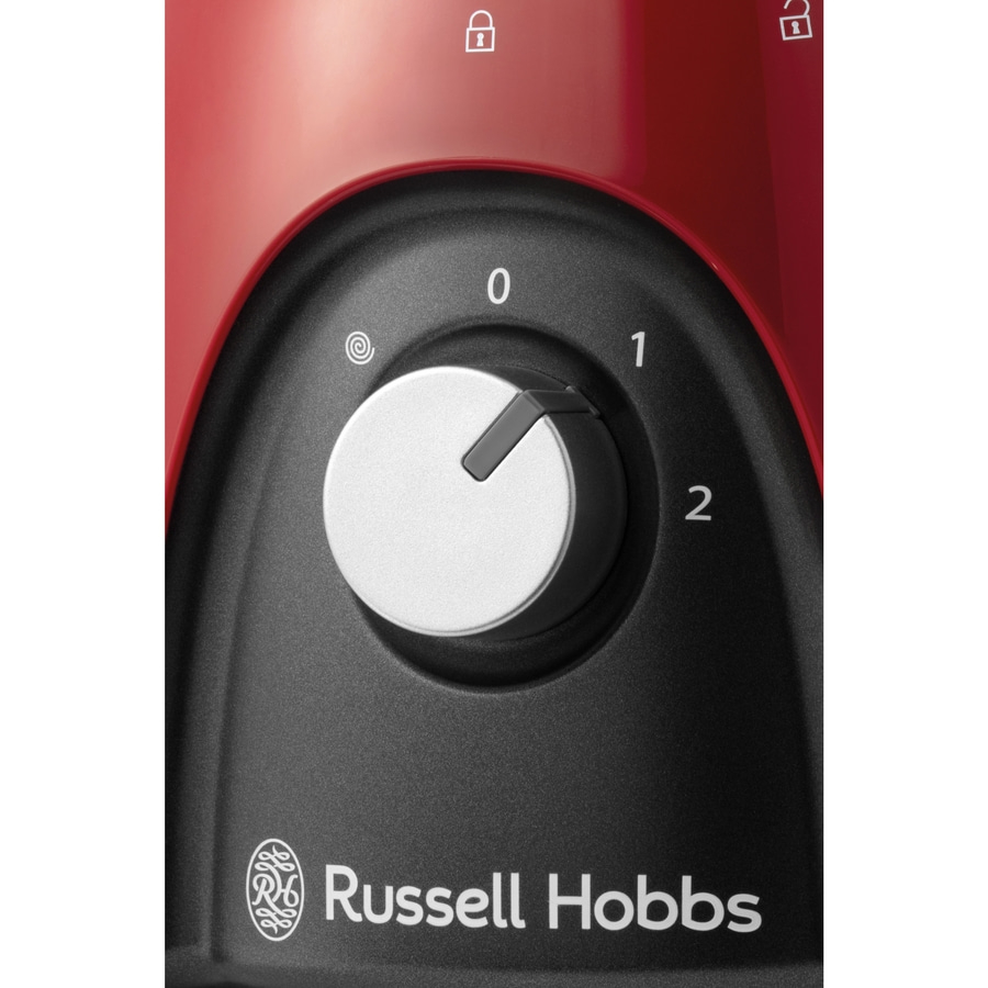Nahaufnahme eines roten Geräts mit Drehknopf, Zahlen und Russell Hobbs Logo.