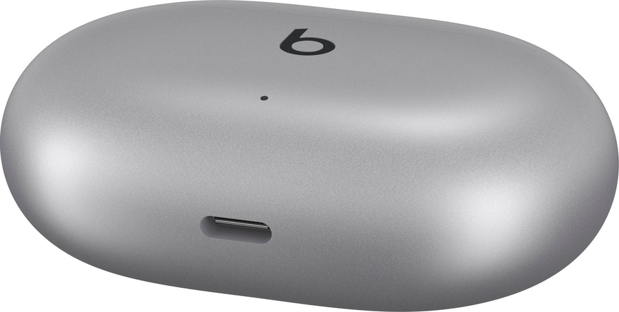 Graue Ladebox für kabellose Kopfhörer mit Beats-Logo und Ladeanschluss.