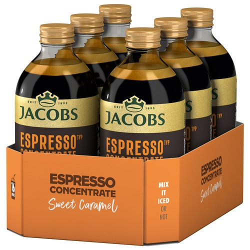 Sechs Flaschen Jacobs Espresso Konzentrat Karamell in einer orangefarbenen Verpackung.