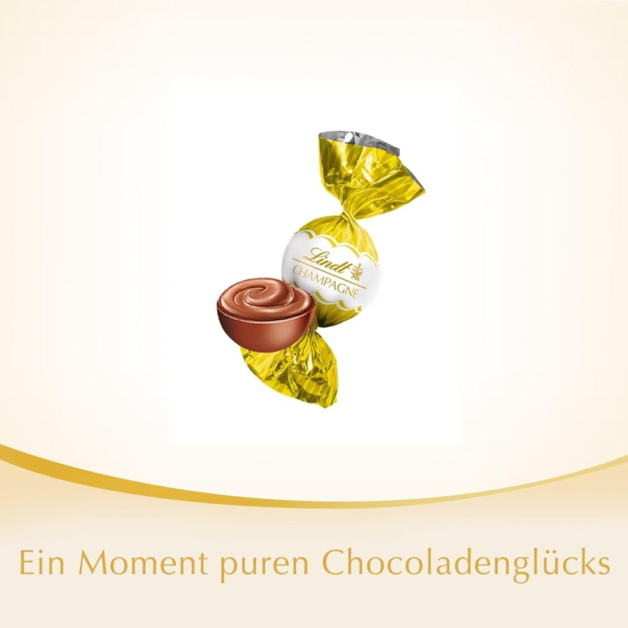 Lindt Champagne Praline mit Schokoladenfüllung und goldener Verpackung. Ein Moment puren Chocoladenglücks.