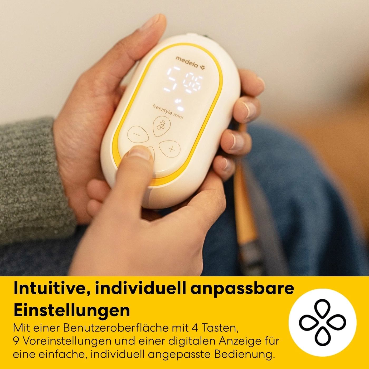 Nahaufnahme einer Hand, die eine Medela Freestyle Mini Milchpumpe bedient, mit Text über intuitive Einstellungen
