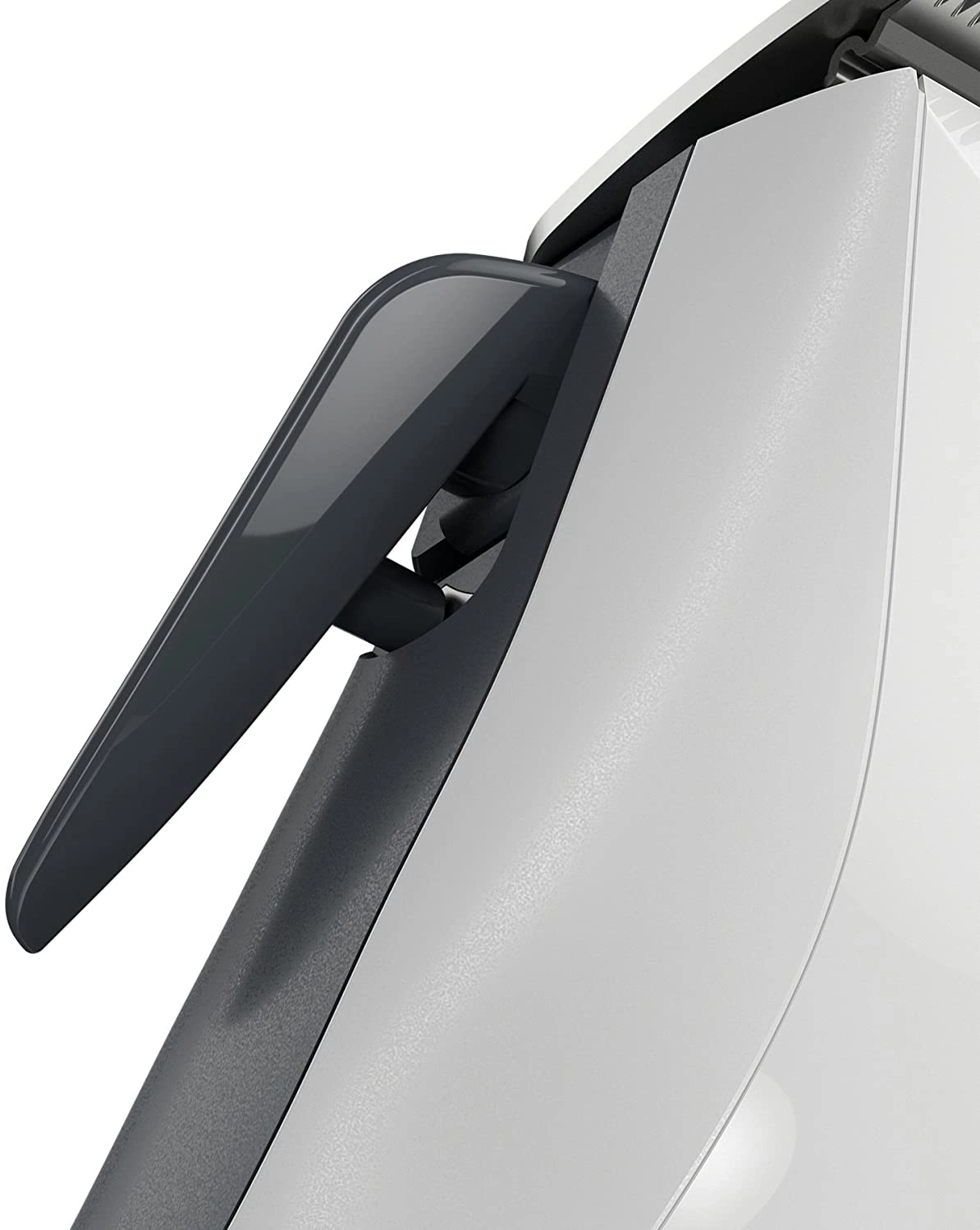 Detailaufnahme eines weißen Rasierers mit einem grauen Hebel und Gehäuse.
