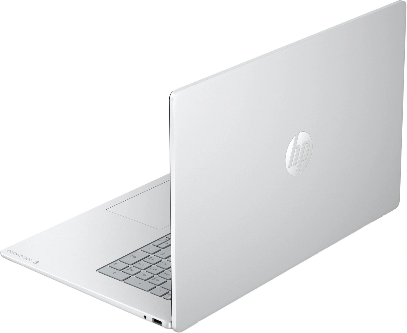 Ein weißer HP Omnibook 3 Laptop mit geschlossenem Deckel und sichtbarer Tastatur.