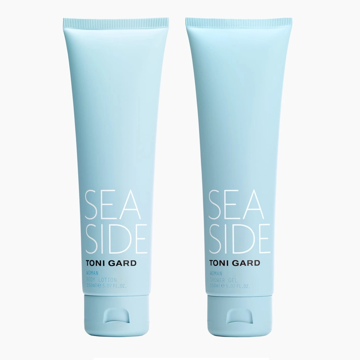Zwei blaue Tuben mit "SEA SIDE" und "TONI GARD" Aufschrift, Body Lotion und Shower Gel.
