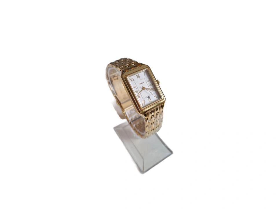 Goldene Armbanduhr mit römischen Ziffern auf einem Ständer