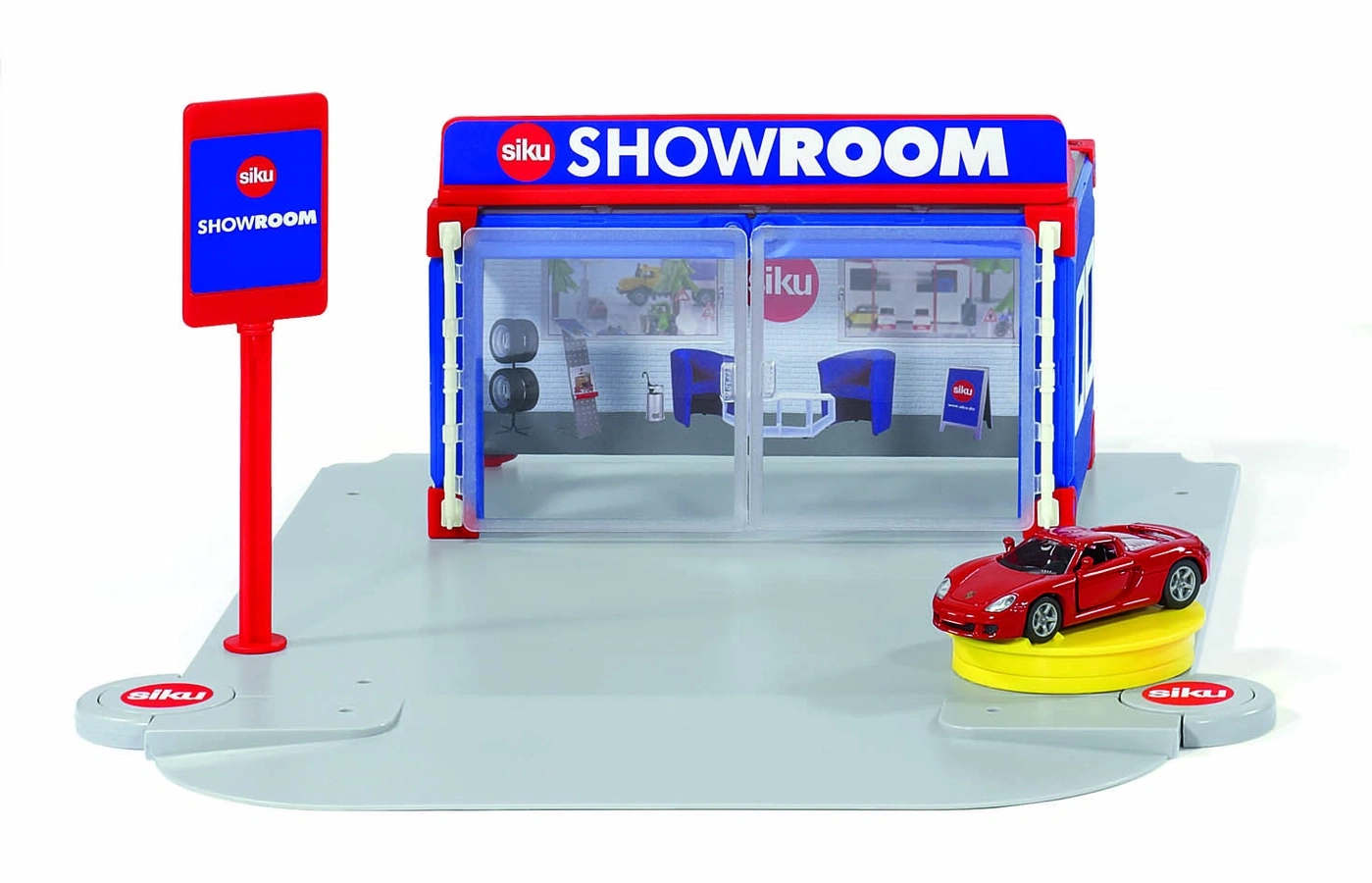 Spielzeug-Autohaus mit rotem Sportwagen und Schild, Siku-Marke.