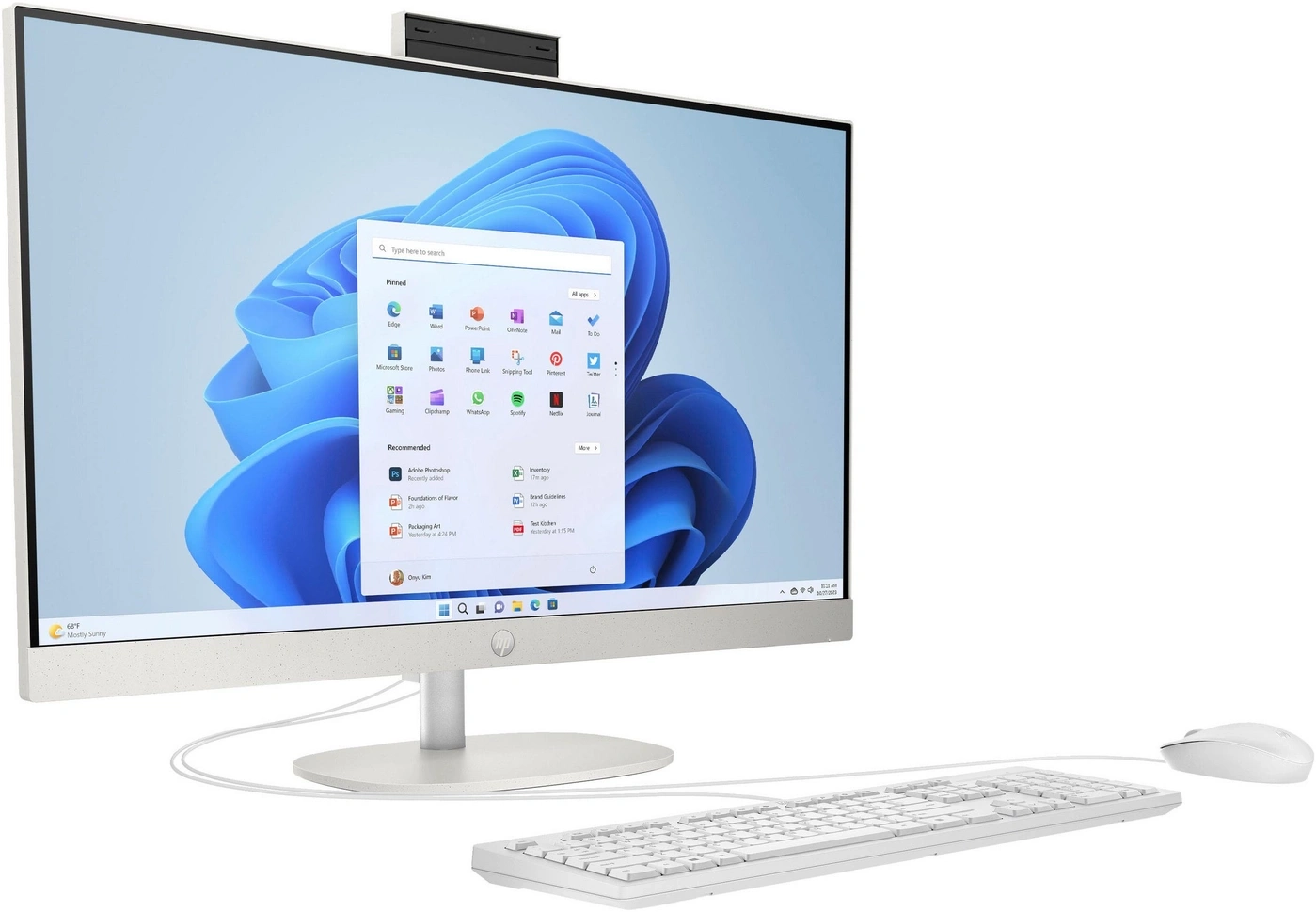 Ein weißer HP All-in-One-Computer mit Tastatur und Maus.