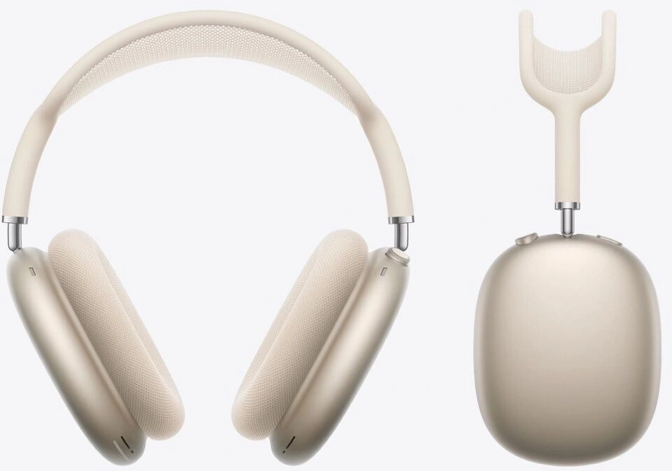 Ein Paar beige Apple AirPods Max Kopfhörer mit Stoff-Ohrpolstern und metallischem Bügel.