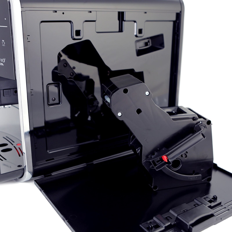 Kaffeemaschine, Innenansicht, schwarze Teile, roter Knopf, geöffnet, Detailaufnahme, Technik