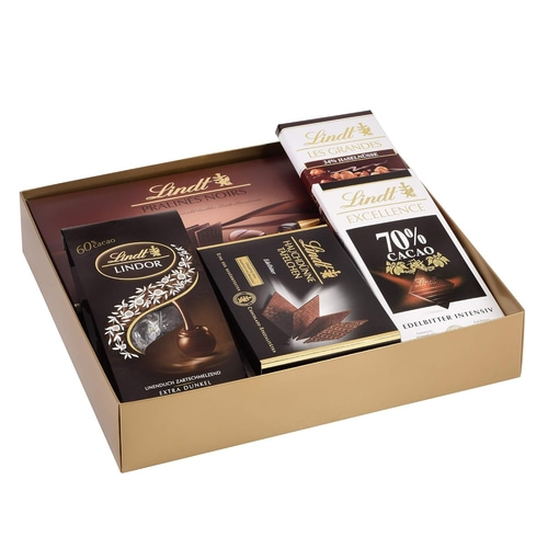 Lindt Schokoladen-Geschenkbox mit verschiedenen Tafeln und Pralinen, goldfarben.