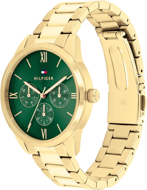Eine goldene Tommy Hilfiger Damenuhr mit grünem Zifferblatt und einem Edelstahlarmband.