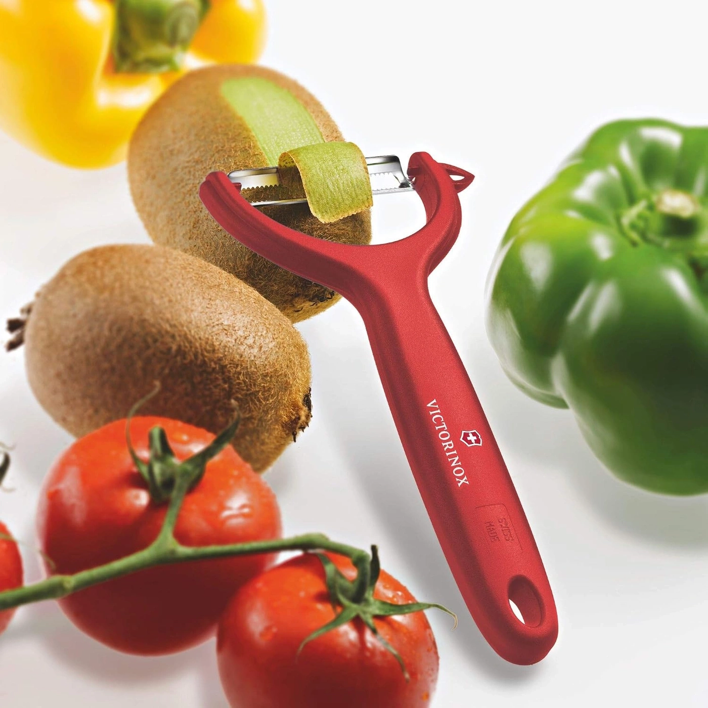 VICTORINOX Sparschäler 7.6079.1 mit Zackenschliff Tomaten- und Kiwischäler Rot
