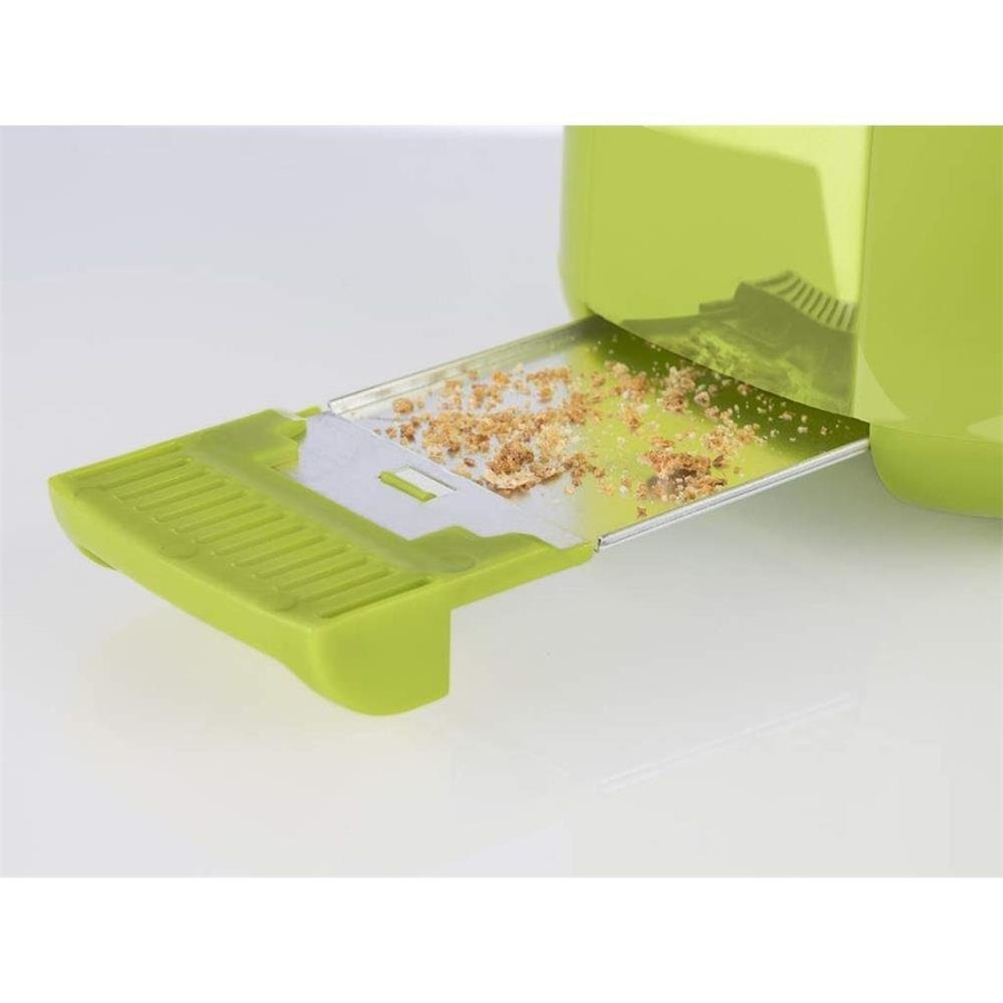 Grüner Toaster mit Krümeln auf der Krümelschublade, Nahaufnahme
