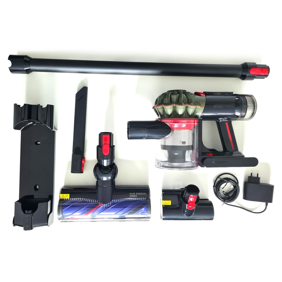 Staubsaugerzubehör mit Hauptgerät, Rohr, Bürsten und Ladegerät.