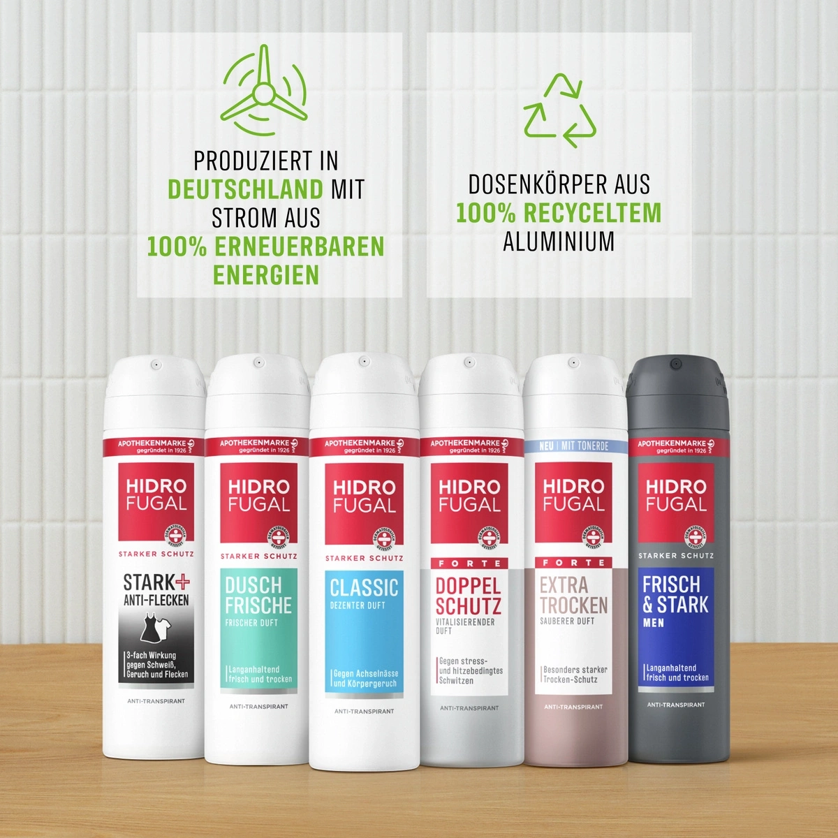 Sechs HIDRO FUGAL Deospray-Flaschen auf einem Holztisch