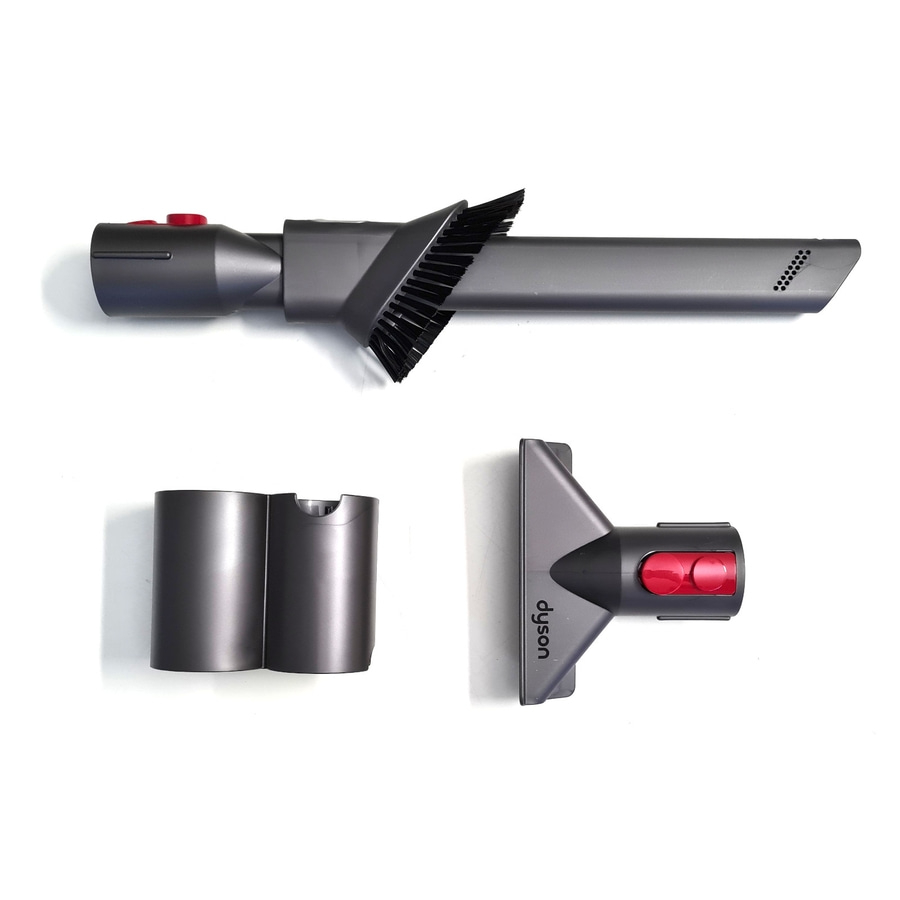 Dyson Staubsauger Zubehörteile auf weißem Hintergrund, Bürste, Düse, Behälter, rot