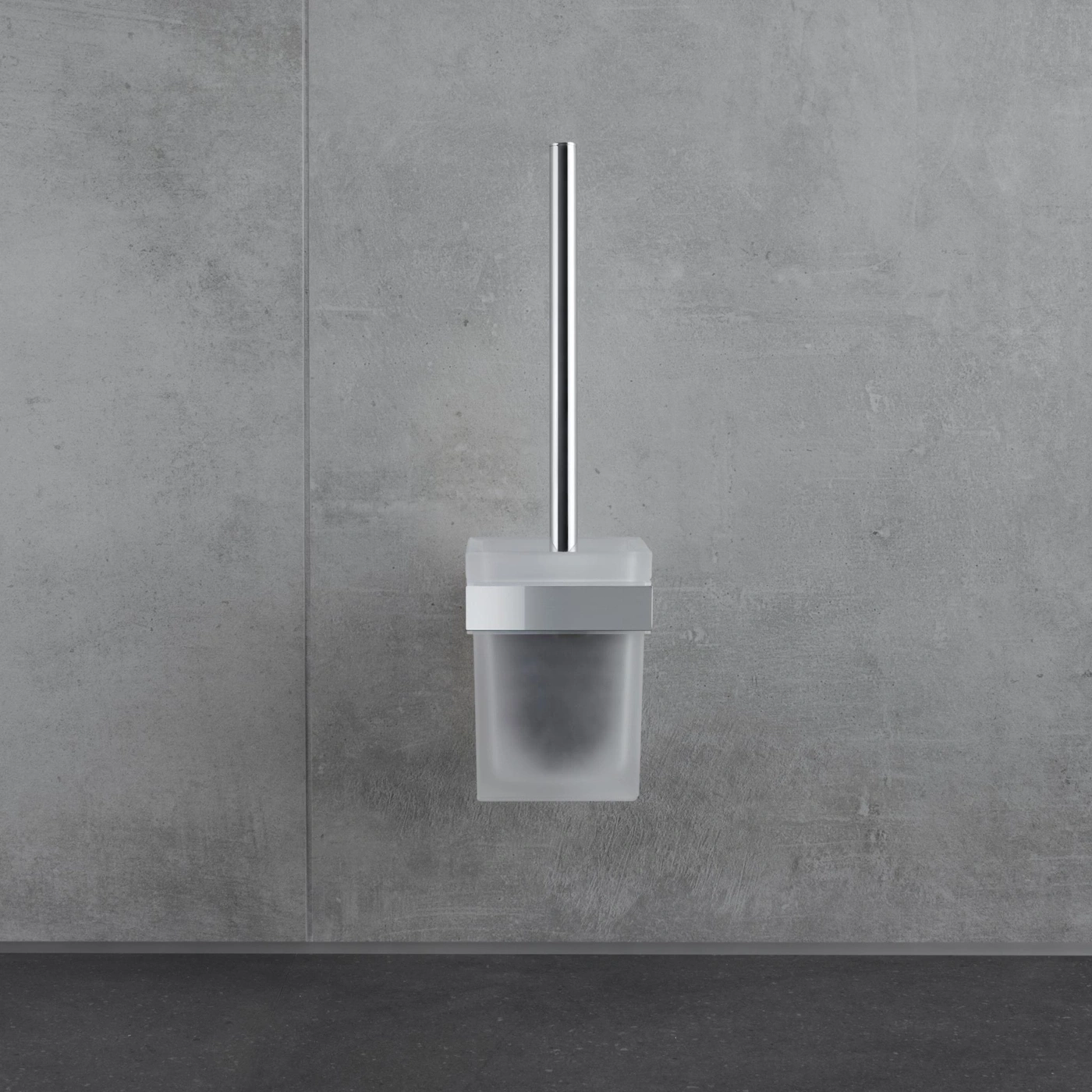 Toilettenbürste an grauer Wand. Edelstahl und Milchglas. Modernes Badezimmer-Accessoire.