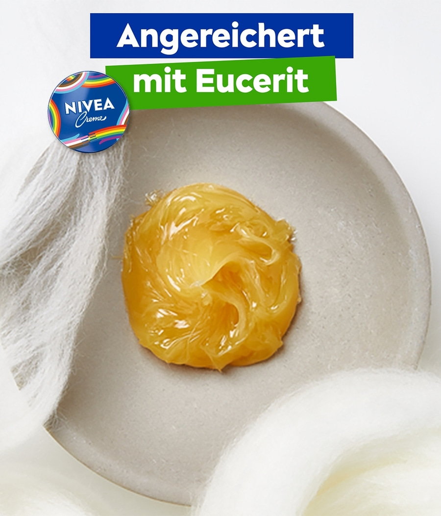 Nivea Creme angereichert mit Eucerit auf einem Teller mit Wolle