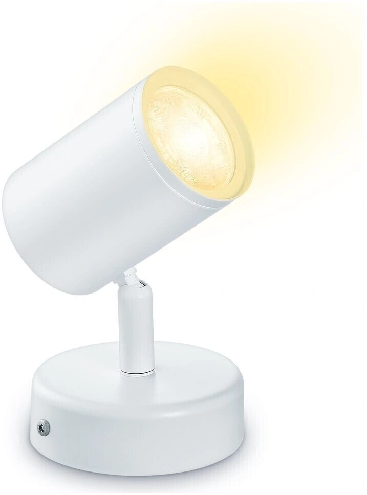 Ein weißer Schreibtischstrahler mit warmem Lichtstrahl