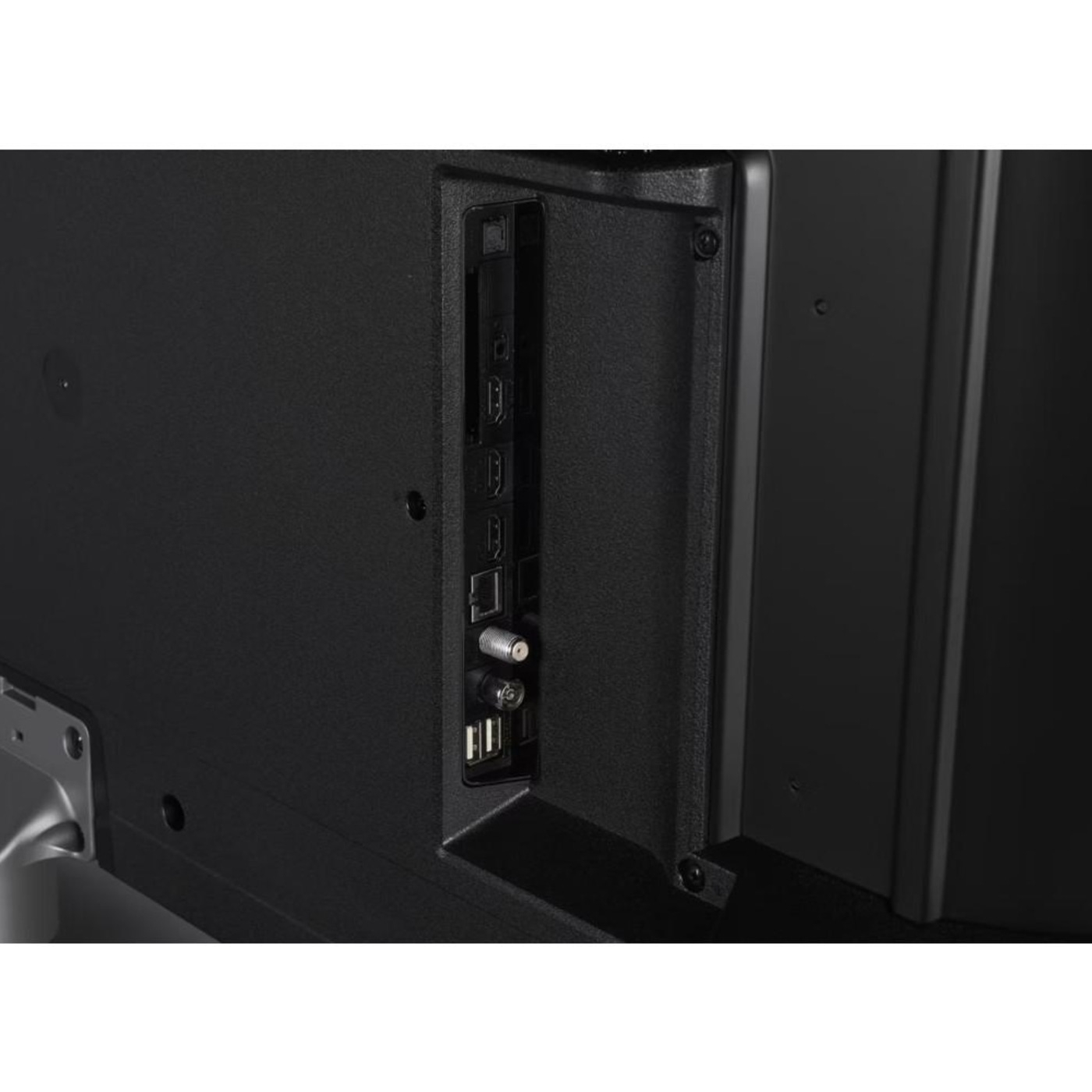 Rückseite eines Fernsehers mit Anschlüssen für Kabel und HDMI.