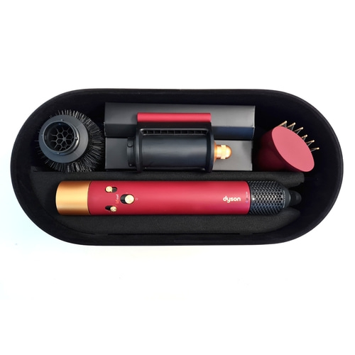Dyson Haarstyler mit verschiedenen Aufsätzen und Aufbewahrungskoffer
