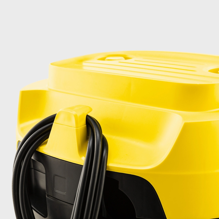 Gelber Staubsauger mit schwarzem Kabel, Detailaufnahme, Nahaufnahme, gelb-schwarz