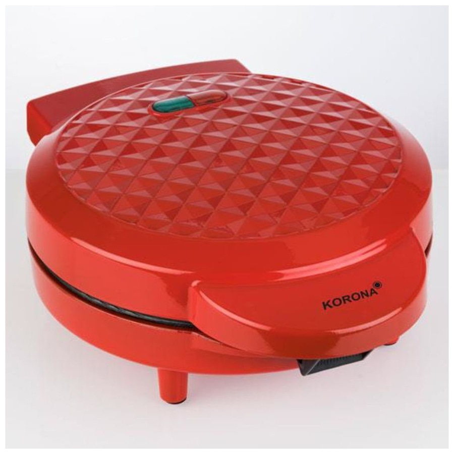 Roter Waffeleisen mit Korona-Logo, rund, mit Diamantmuster auf der Oberseite.