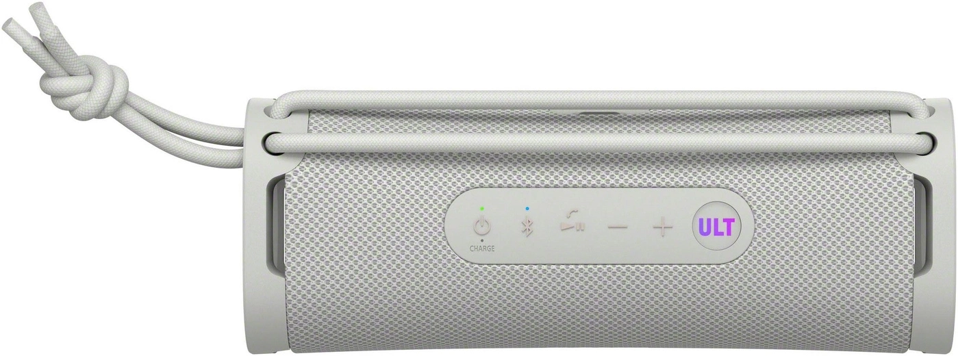 Ein weißer Bluetooth-Lautsprecher mit silbernen Akzenten und einem "ULT"-Knopf.