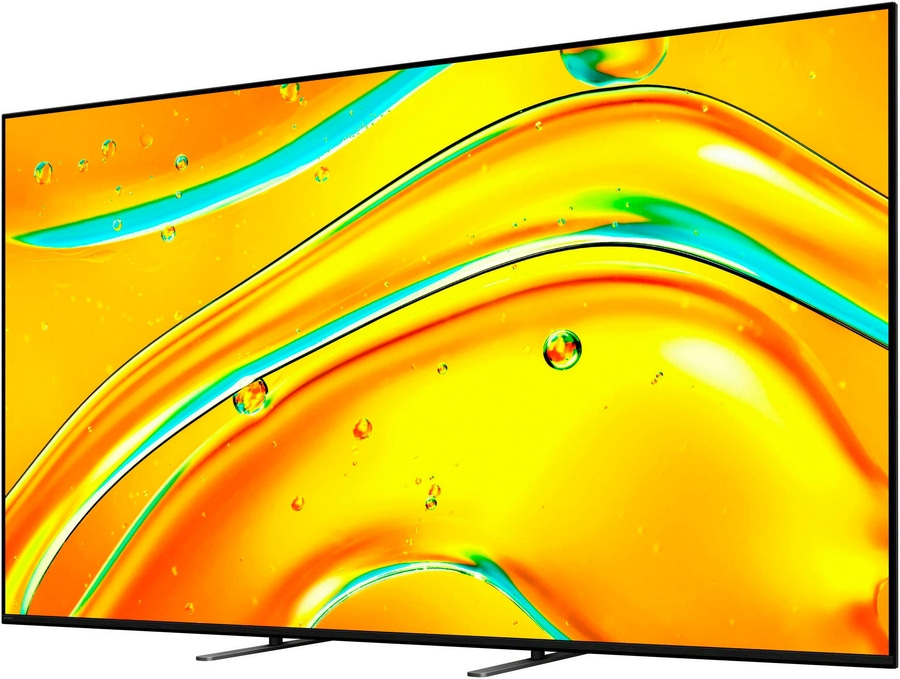 Ein Fernseher mit gelbem Hintergrund und Wasserblasen, die sich darin befinden.