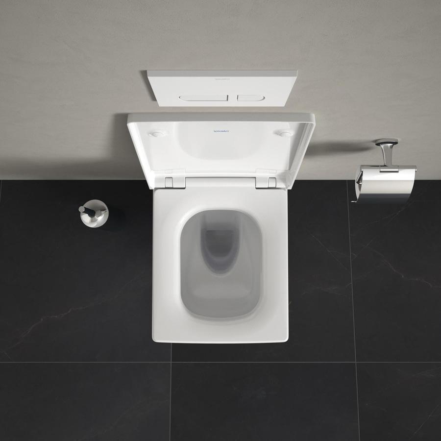 Draufsicht auf eine weiße Toilette mit offenem Deckel und schwarzem Boden