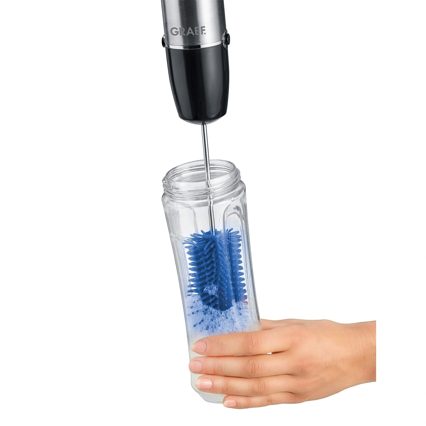 Reinigung einer Flasche mit einer Bürste und einem Gerät von Graef