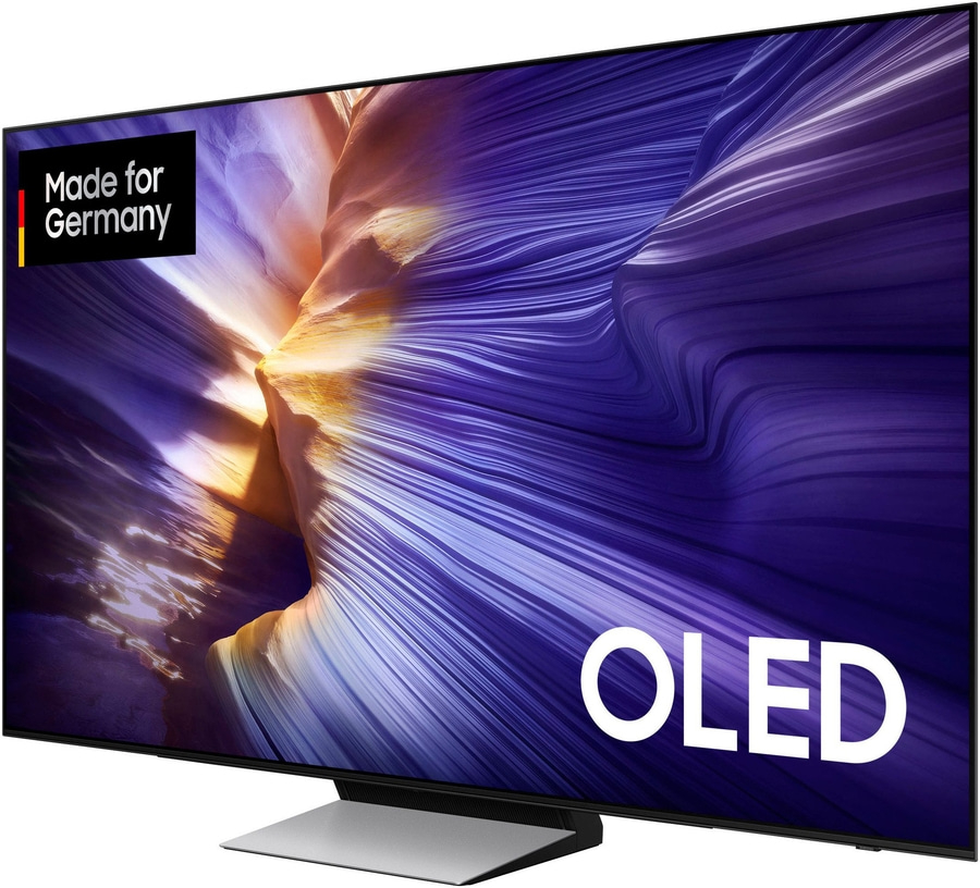 Ein moderner OLED-Fernseher mit dem Schriftzug "Made for Germany" und einem abstrakten Hintergrund.
